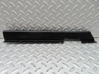 W123 front right cable channel cover used OEM