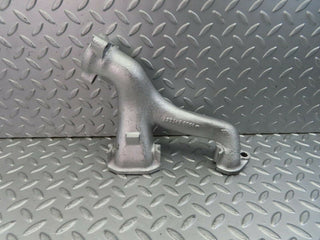 W111 exhaust manifold used OEM