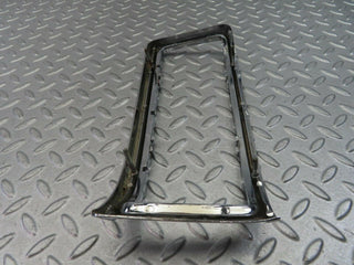 W115 tail light chrome frame left used OEM