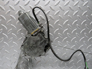W124 Wagon rear left window regulator and motor used OEM