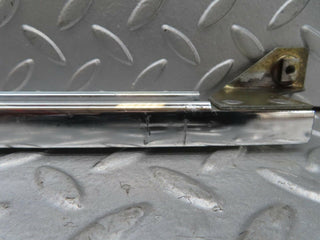 W123 rear left chrome window channel used OEM