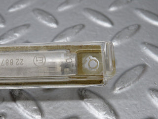 R129 SL number plate light used OEM