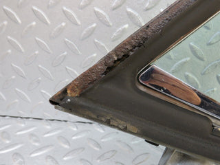 W109 front left quarter window glass used OEM