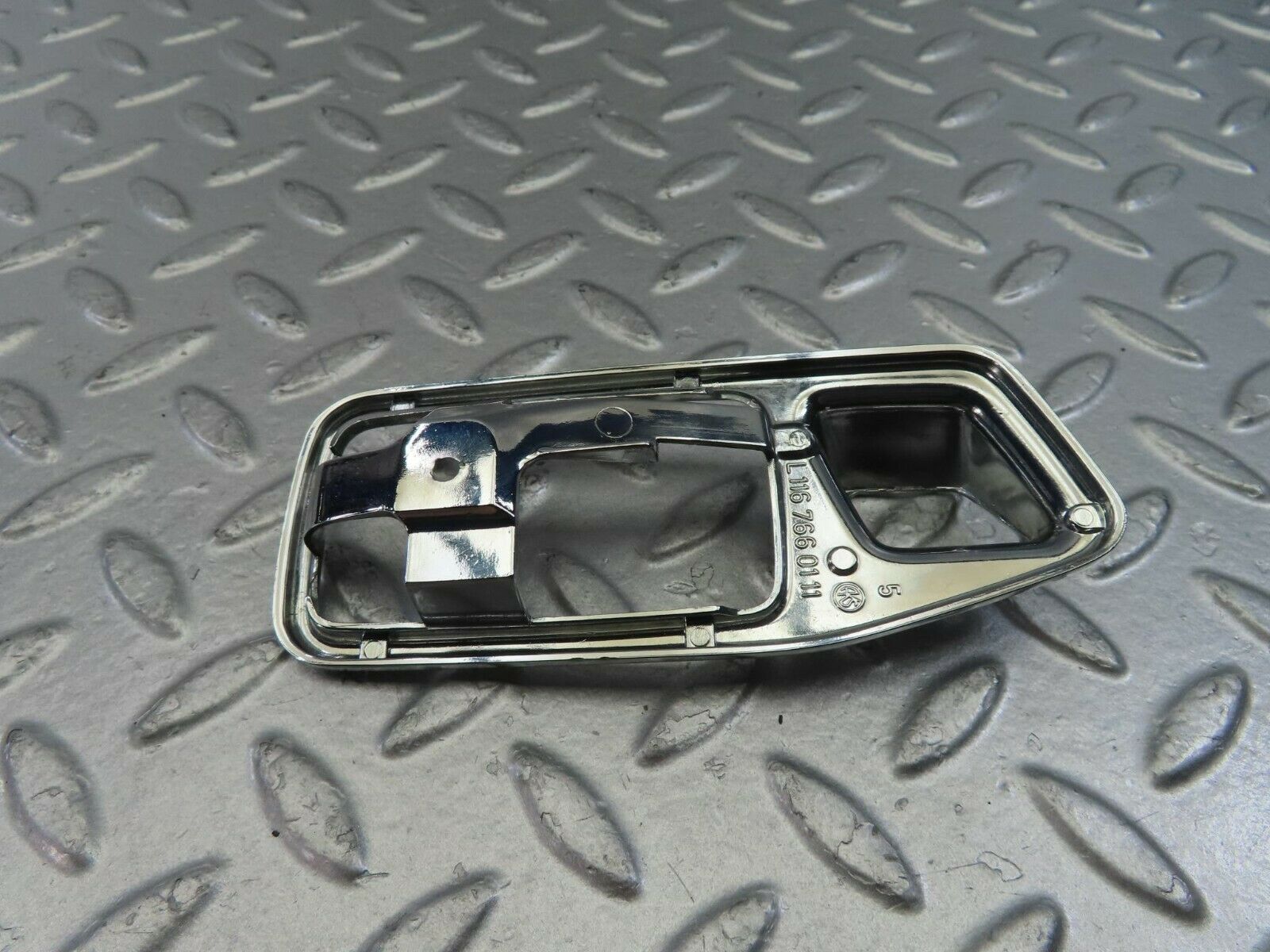 10833 Mercedes-Benz W123 230E Chrome Frame For Door Opener Left 1167660111