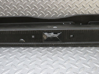 W202 trunk lock trim panel used OEM