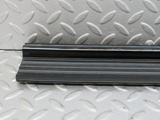 W123 rear right door sill trim black used OEM