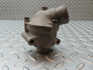 W123 thermostat housing used OEM