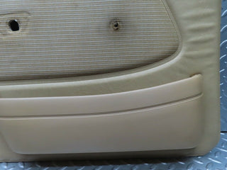 W123 front left door card beige used OEM
