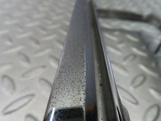 W115 tail light chrome frame left used OEM