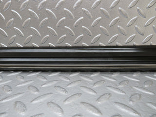 W123 front left door lower moulding trim used OEM
