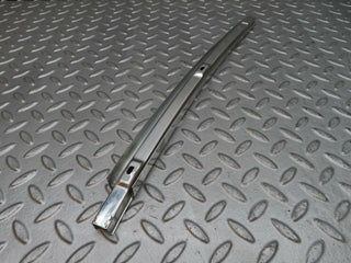 W108 rear left chrome window channel used OEM