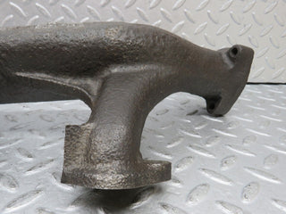 W123 exhaust manifold used OEM