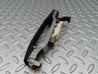 W124 exterior door handle rear left used OEM