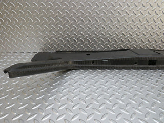 W124 Coupe trunk lock trim panel used OEM