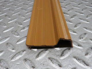 W123 rear right door sill trim palomino used OEM