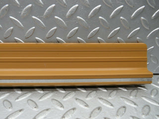 W123 Wagon rear right door sill trim palomino used OEM
