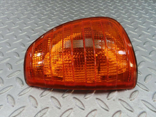W123 indicator light front left used OEM