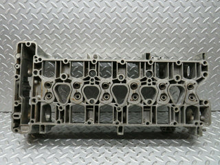 W123 Wagon camshaft bearing casing used OEM