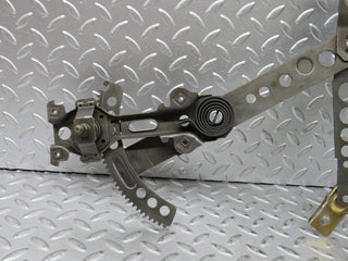 W123 Wagon front left manual window regulator used OEM