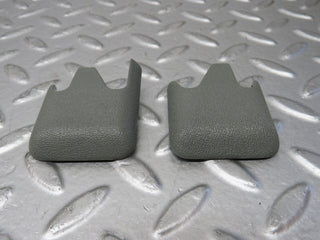 W124 front seat rail trim cover pair used OEM