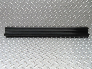 W123 front left door sill trim black used OEM