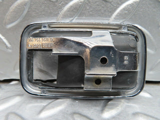 W123 door opener chrome frame right used OEM