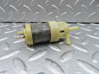 W123 windscreen washer pump used OEM