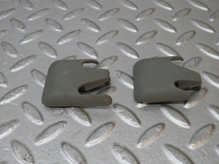 W124 Wagon front seat rail trim cover pair used OEM