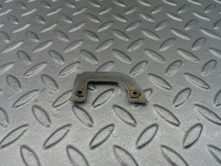 W115 left interior chrome door latch trim used OEM