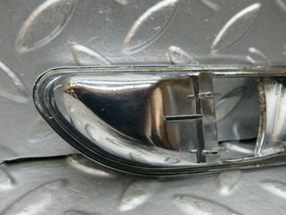 R107 SLC interior door handle chrome surround right side used OEM