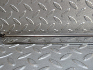 W109 front right door sill chrome used OEM