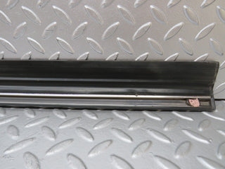 W123 front left door lower moulding trim used OEM