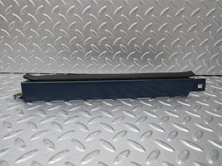W124 Wagon under headlight trim left used OEM