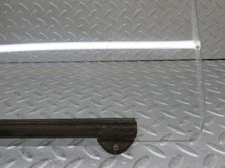 W108 front left door window glass used OEM