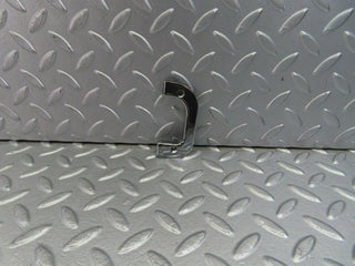 W123 left interior chrome door latch trim used OEM