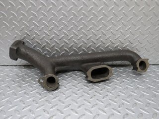 W123 exhaust manifold used OEM