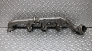 W126 Coupe exhaust manifold left side used OEM