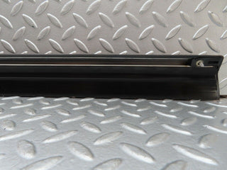 W123 front right door lower moulding trim used OEM