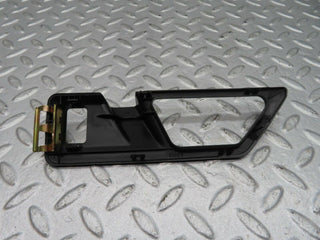 W124 front door opener frame left used OEM