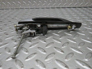 W123 front left exterior door handle used OEM