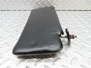 W123 sun visor left side black used OEM
