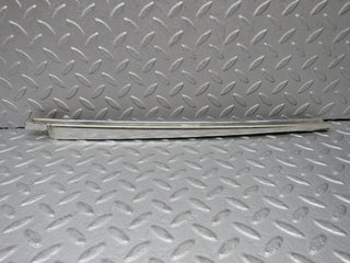 W108 front left door chrome window channel used OEM