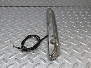 W108 number plate light trunk lid chrome used OEM