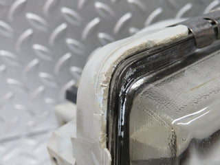 W123 headlight left side used OEM