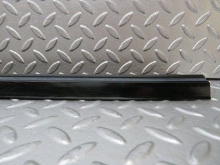 W123 front left door sill trim black used OEM