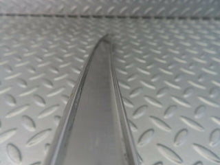W116 rear left chrome window channel used OEM