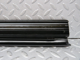 W123 front left door sill trim black used OEM