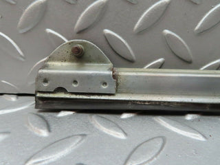 W108 front left door glass holder used OEM