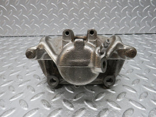 W124 Wagon front left brake caliper used OEM