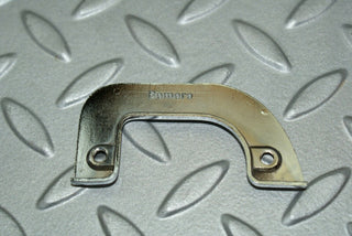 W115 left interior chrome door latch trim used OEM
